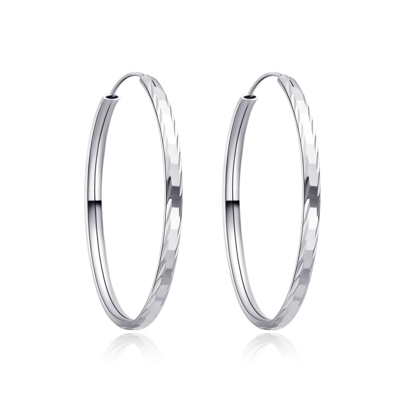 Drobné stříbrné náušnice kruhy 18 mm — Marre.cz