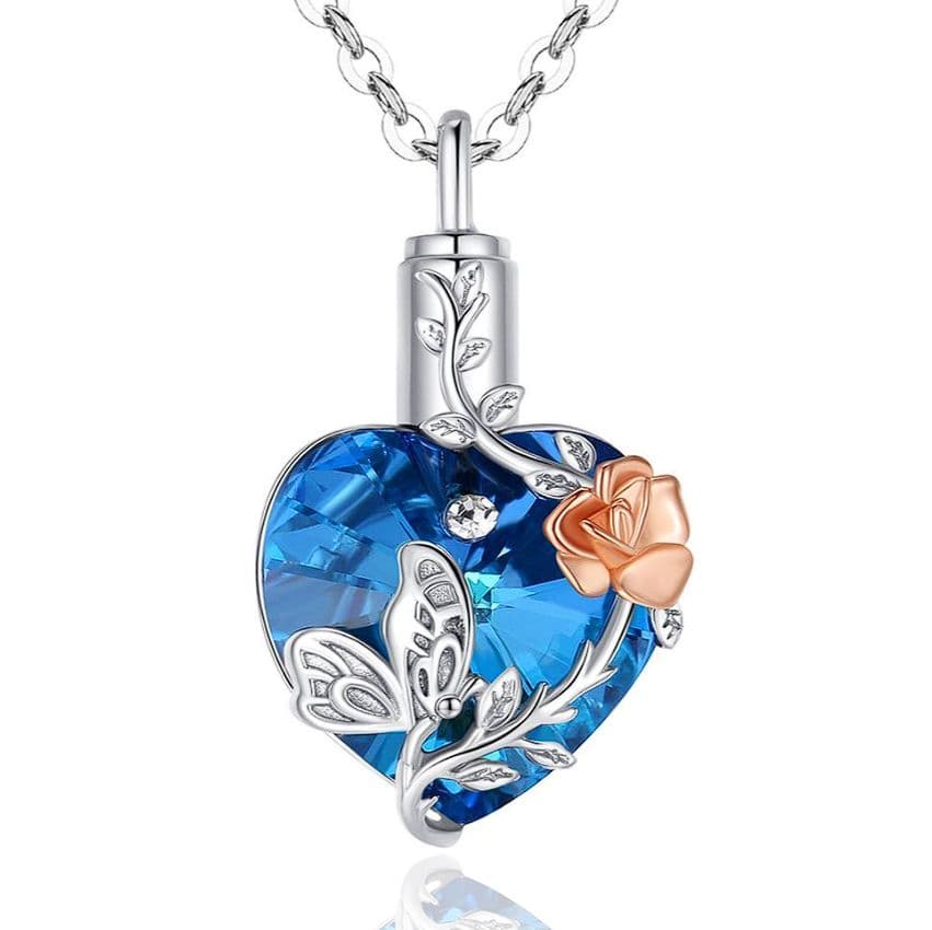 Stříbrný pietní náhrdelník - Modré Swarovski srdce s růží a motýlem